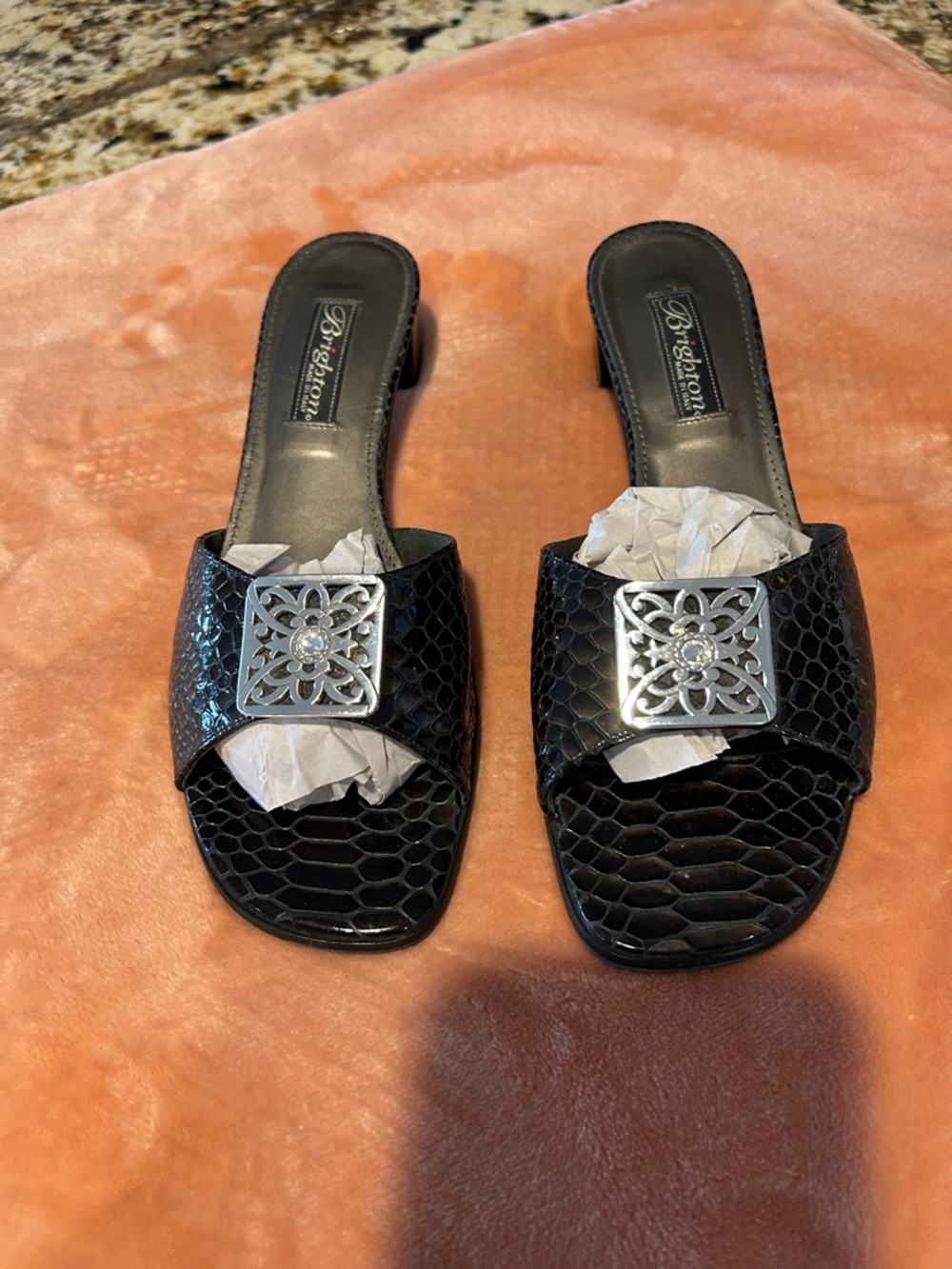 Brighton Black Textured Slide Mules with Silver Medallion